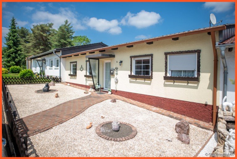 Wohnen auf einer Ebene V�lklingen / Lauterbach Einfamilienhaus Wohnen auf einer Ebene - Beidseitig angebauter Bungalow mit Doppelgarage in absolut ruhiger Wohnlage