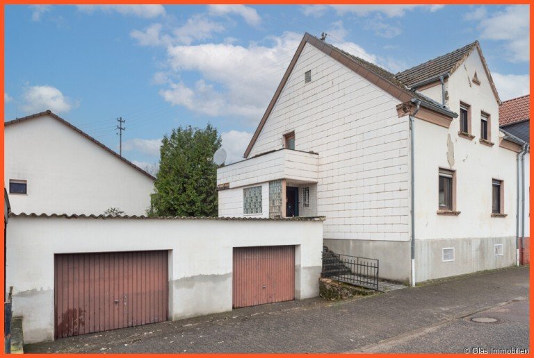 Einfamilienhaus mit zwei Garagen Wadgassen Doppelhaush�lfte Hostenbach - Einfamilienhaus mit 2 Garagen in ruhiger Wohnlage