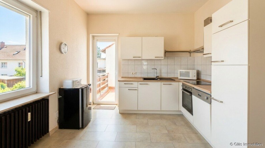 K�che mit Zugang zum Balkon Mehrfamilienhaus Bous