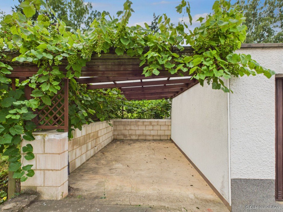 Pergola neben Garage Zweifamilienhaus Wadgassen