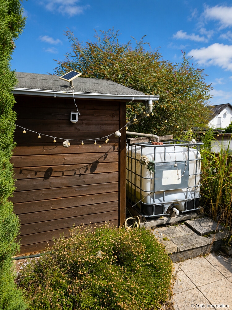 Gartenhaus mit Regenwassertank Bungalow �berherrn