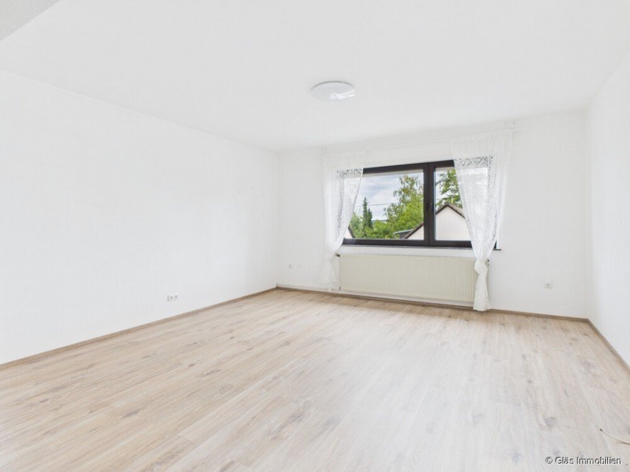 Wohnzimmer im 1. OG Zweifamilienhaus Wadgassen