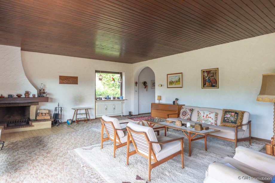 Wohnzimmer mit angrenzendem Arbeitszimmer Einfamilienhaus Gro�rosseln