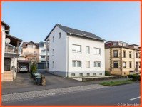 Hauptbild Attraktive Kapitalanlage - Vollvermietetes Dreifamilienhaus mit 5 Garagen in zentraler Lage