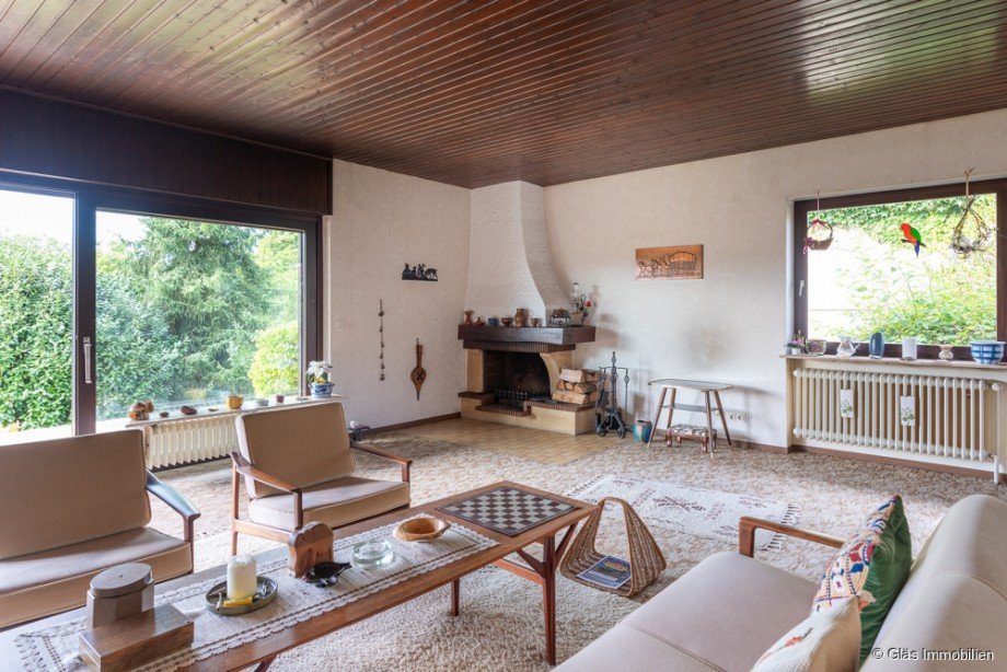Wohnzimmer mit offenem Kamin Einfamilienhaus Gro�rosseln
