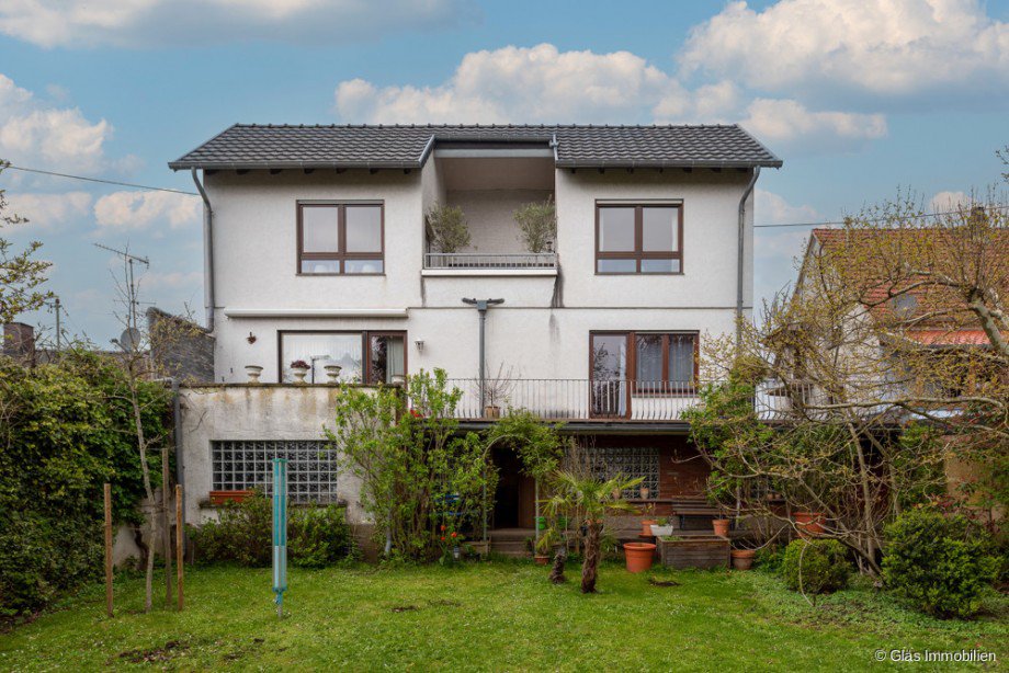 Gartenansicht Zweifamilienhaus Bous
